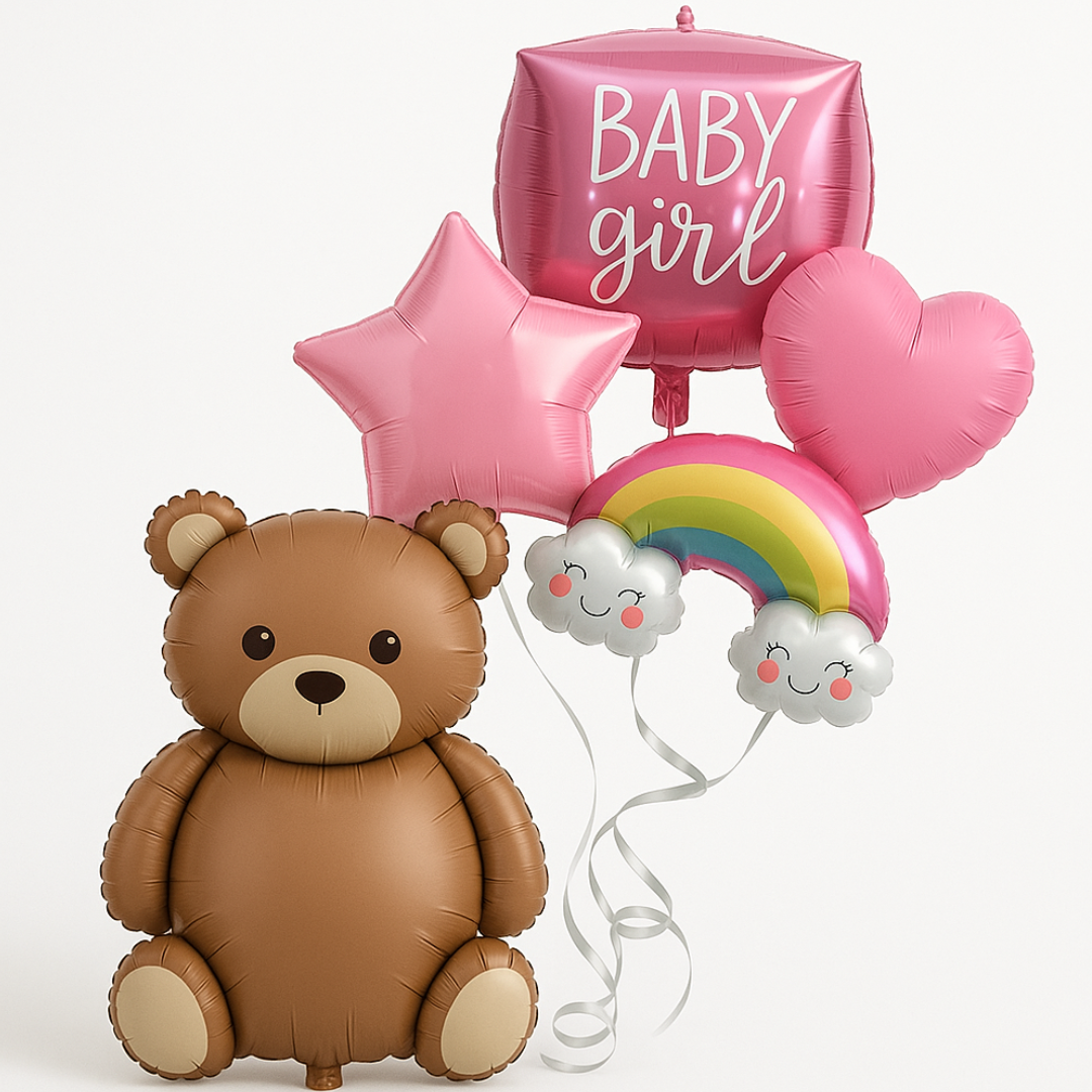 Baby girl celebration setup with large teddy bear balloon, pink star and heart foil balloons, rainbow with smiling clouds, and a newborn baby wrapped in pink β perfect for baby shower or photo backdrop.