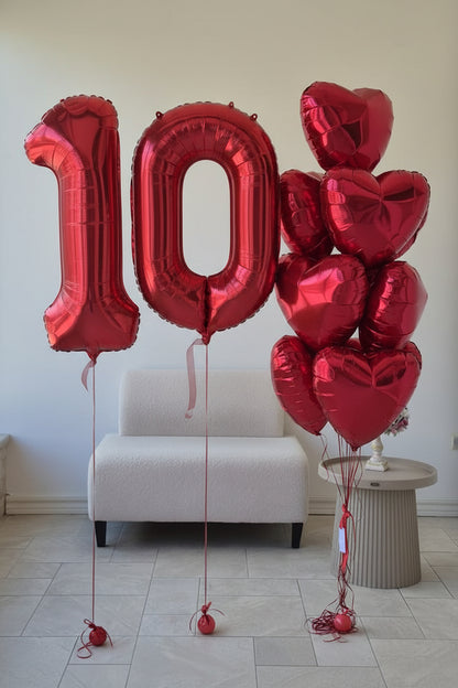 Close-up of red number 0 foil balloon finish