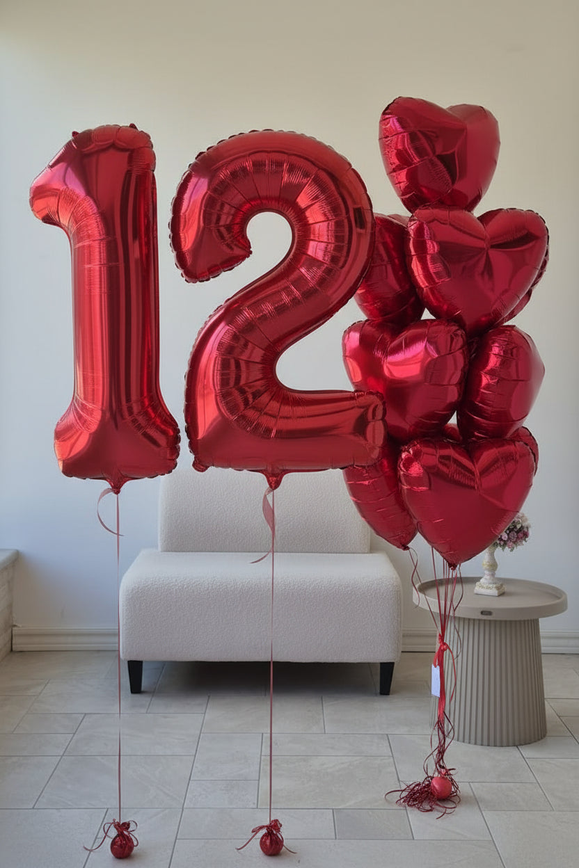 Close-up of red number 2 foil balloon finish