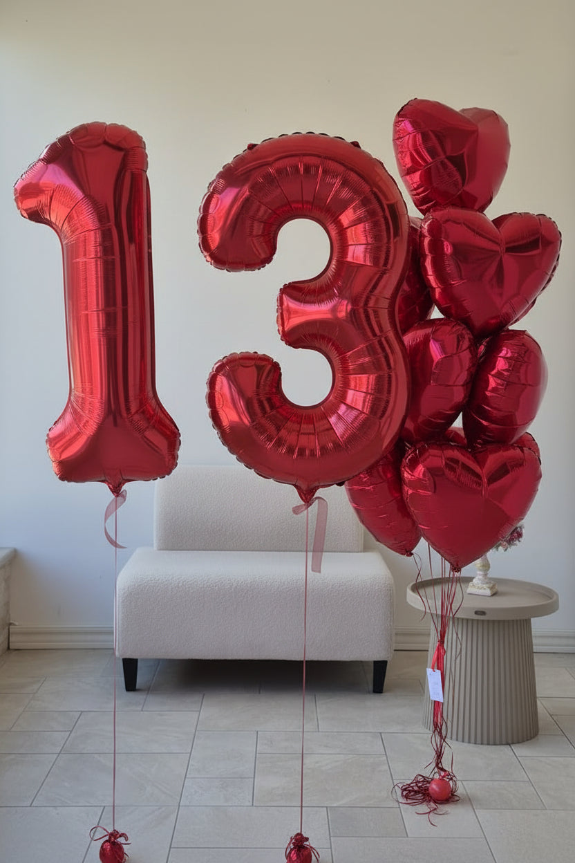 Close-up of red number 3 foil balloon finish