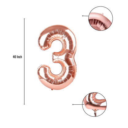 Close-up of rose gold number 3 foil balloon finish