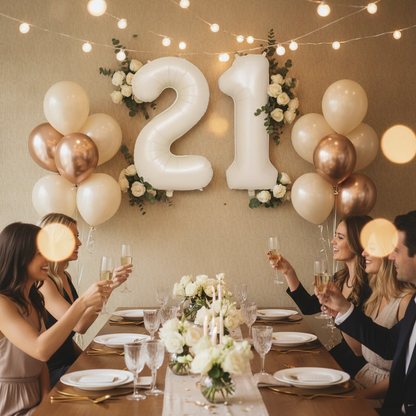 Beige 21st birthday party decoration with number balloons